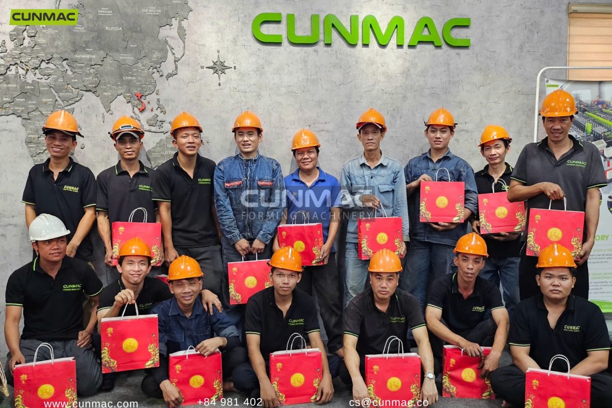 CUNMAC team members receiving Mid-Autumn Festival gifts